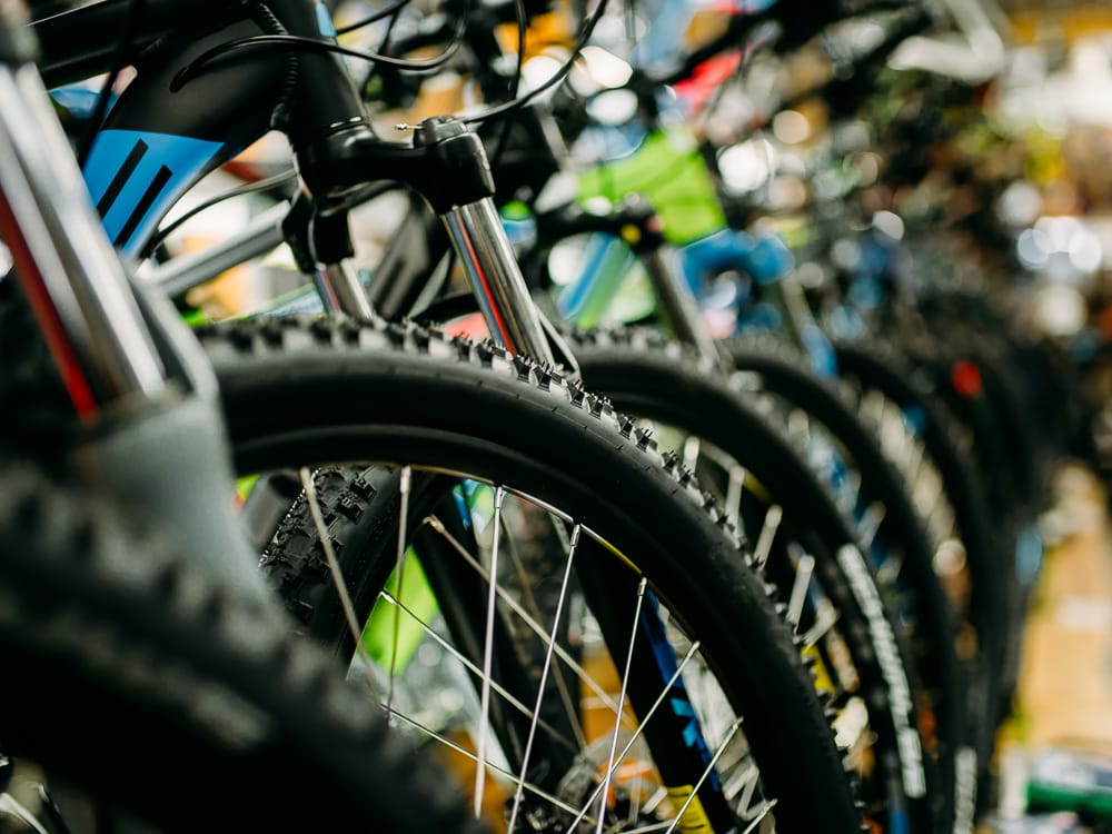 Bicycle shop, rows of new bikes, cycle sport store